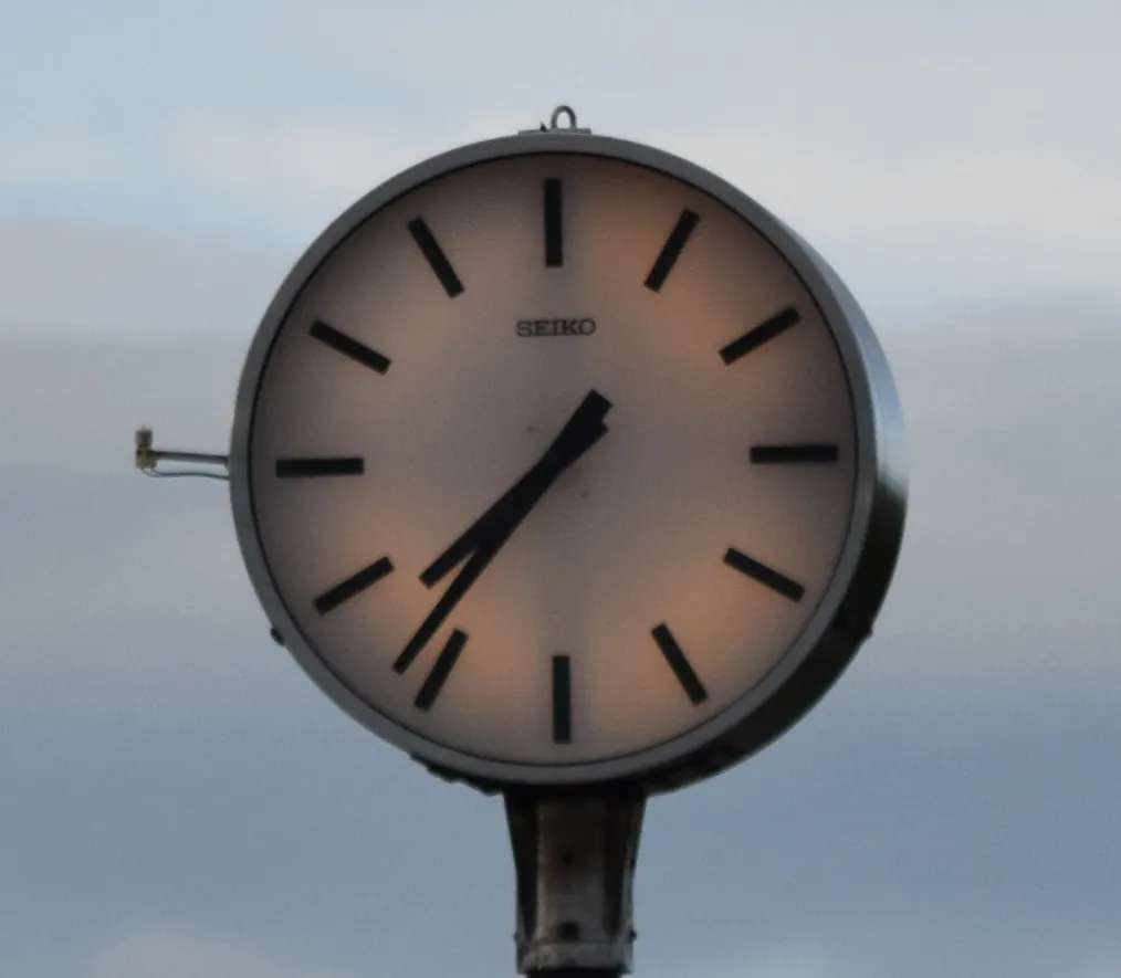 Nikkor 55-300mm clock seen from 30m, Elder Gate, Milton Keynes, 135mm, cropped
