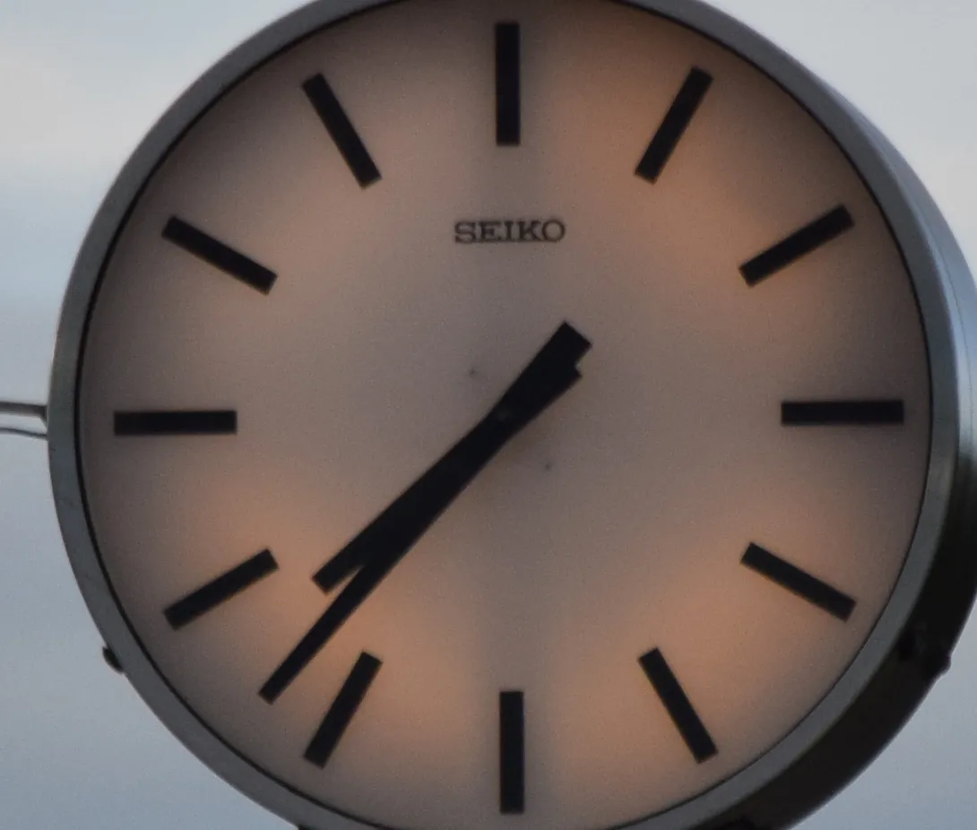 Nikkor 55-300mm clock seen from 30m, Elder Gate, Milton Keynes, 250mm, cropped
