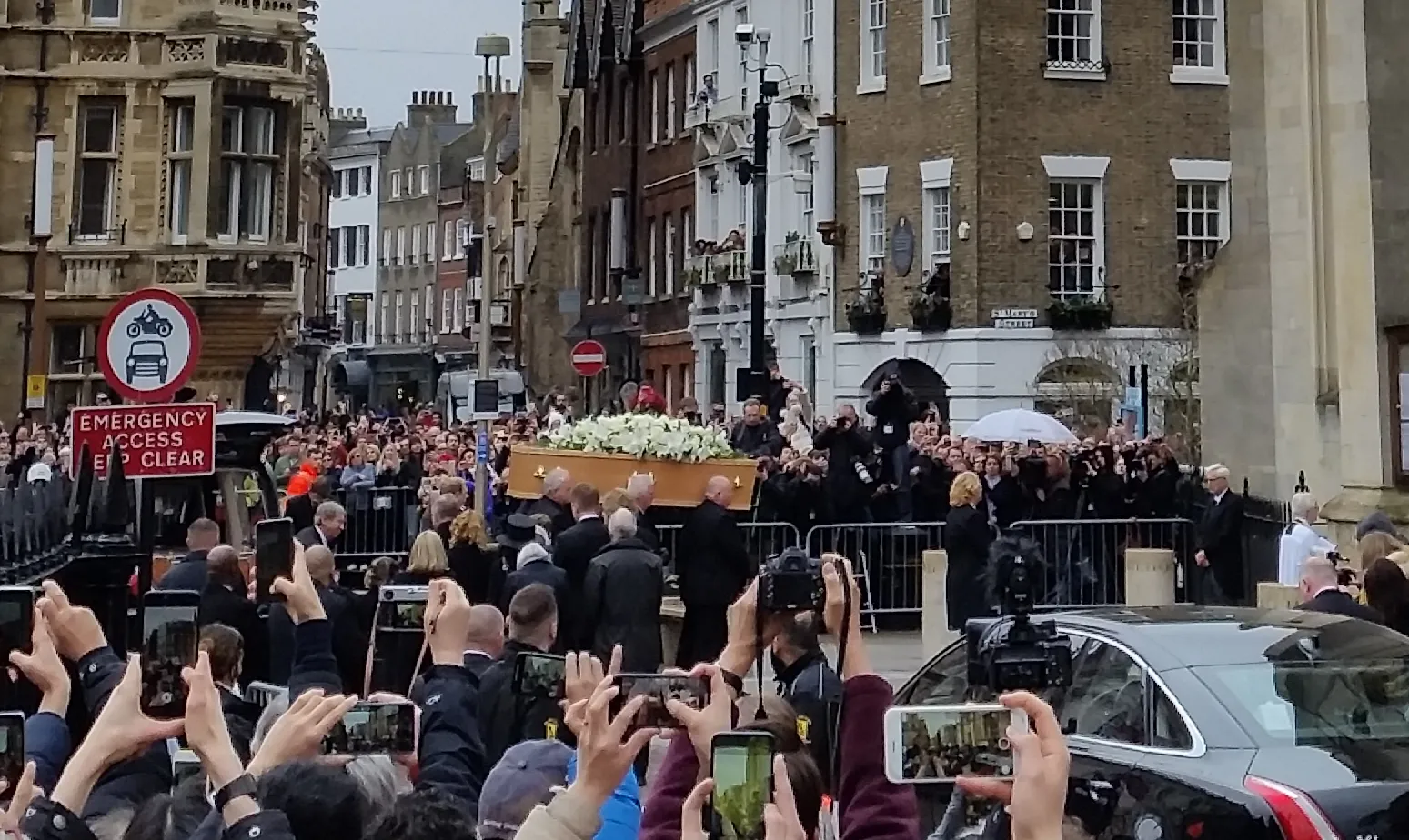 Stephen Hawking's coffin is carrying to Great St Mary's Church in Cambridge
