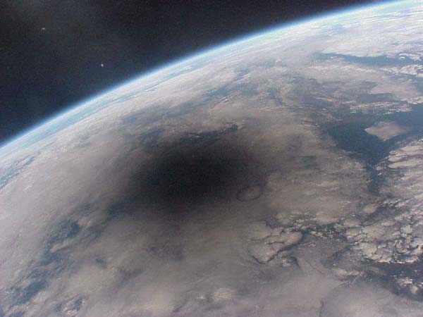 Lunar shadow seen from the MIR station, total solar eclipse 1999